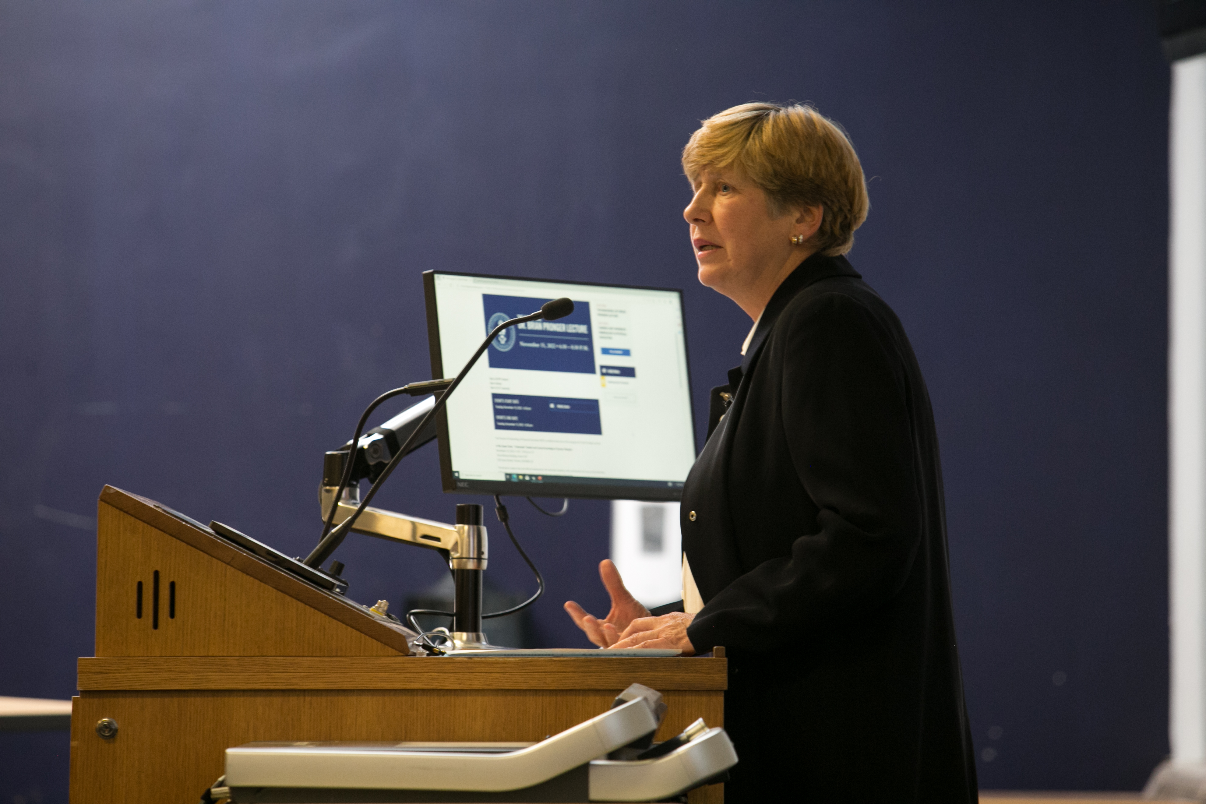 genevieve rail speaking at podium at inaugural brian pronger lecture