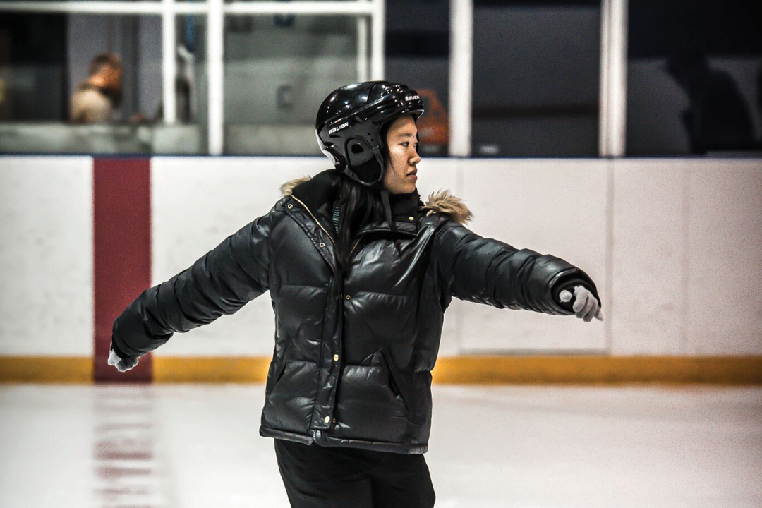 girl skating in an arena