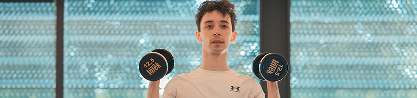 Man holding dumbbells