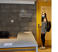 female student at entrance of registrar's office