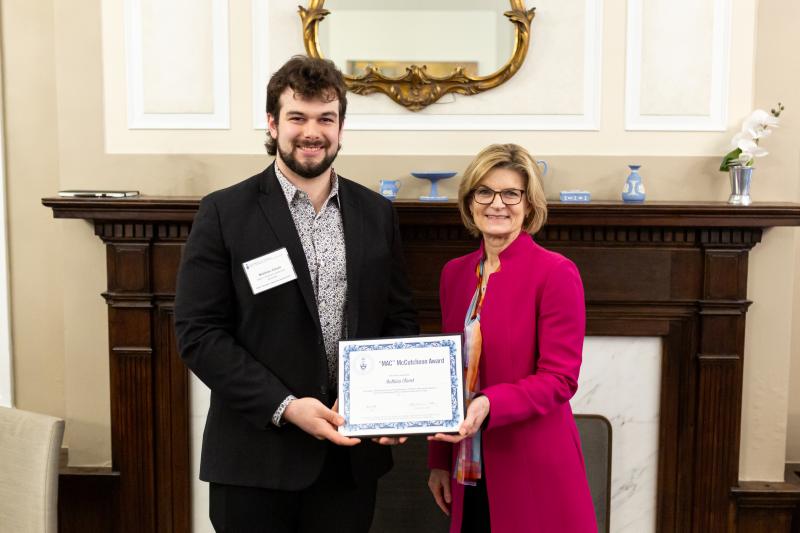 Mathieu Clavet and Dean Gretchen Kerr pose with Matt's McCutcheon Award