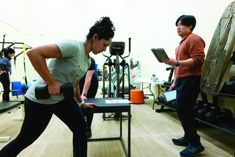 A Ms. FIT study participant exercises in the lab