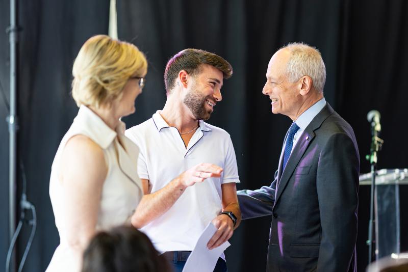 KPE Dean Gretchen Kerr, Carter Holmes, and U of T President Meric Gertler share a laugh