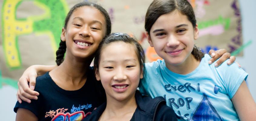 Three girls smiling