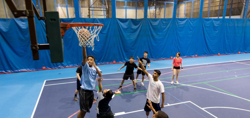 students playing basketball