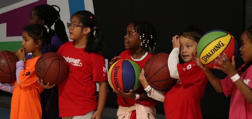 Image of girls playing with basketballs provided by MLSE Foundation