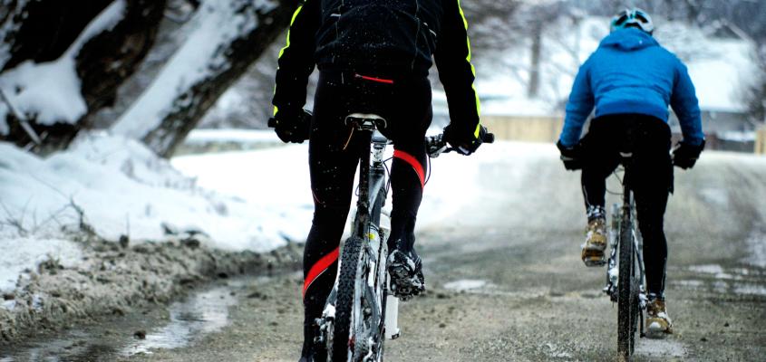 iStock image of two men cycling to illustrate grad student research of cyclists
