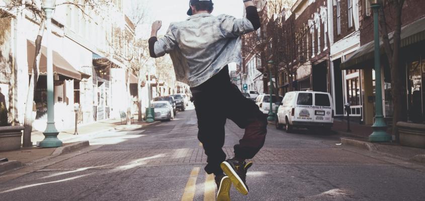 man dancing on street