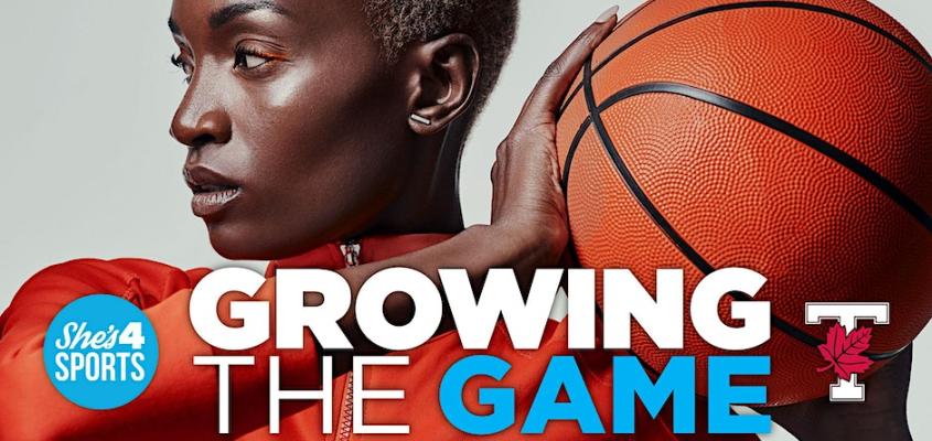 Dark skinned woman with short hair looking to the side with focussed determination while holding a basketball