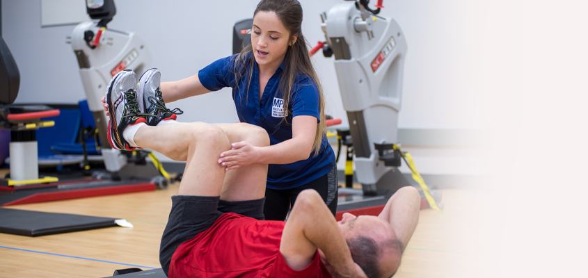 masters student works with client in a clinic