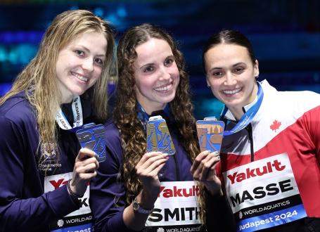 Kylie Masse, on the right, made history when she won bronze at the World Aquatics Swimming Championships in December