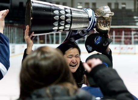 image of coach Vicky Sunohara celebrating an OUA win with her team 